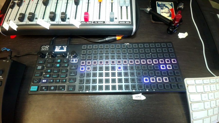 An OXI One sequencer with lit pads
